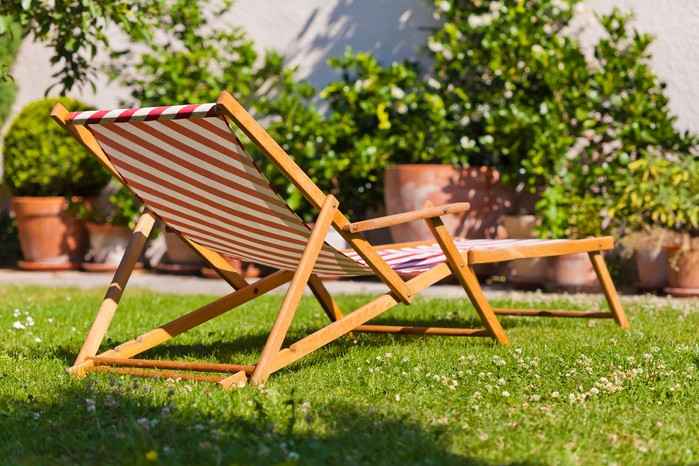 Deckchair on lawn. Getty Images