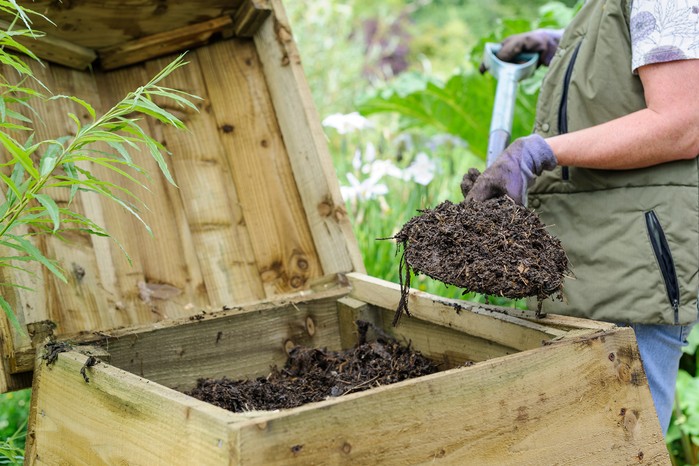 Compost in a wooden composter. Jason Ingram