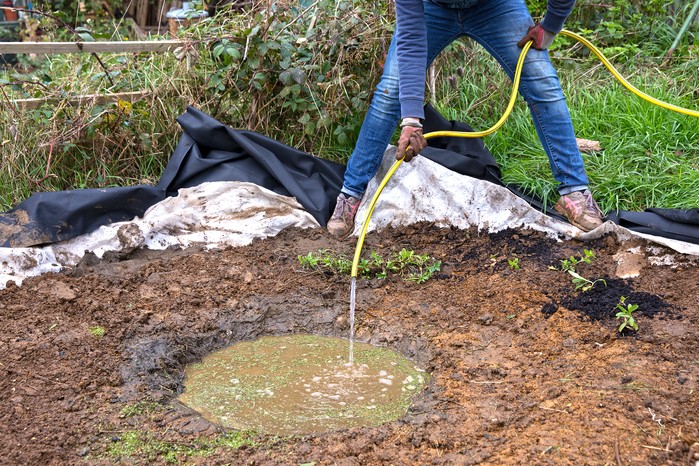 How to make a wildlife pond - adding water to the pond