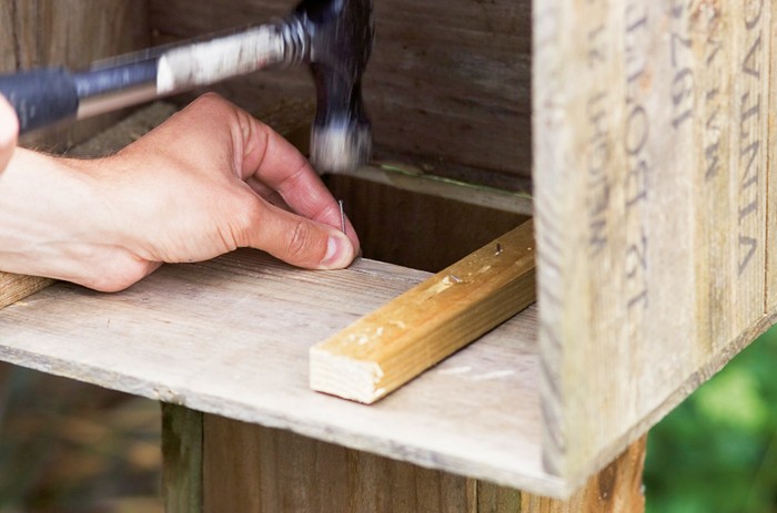 How to make a hedgehog house - attaching the tunnel to the crate