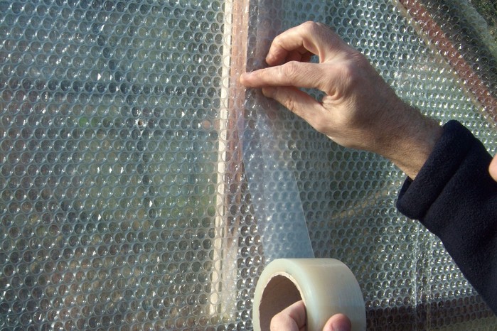 Joining sheets of bubble-wrap with clear, weatherproof tape